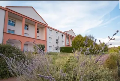 Jardin de l'établissement Appartement avec parking - Futuroscope - 1 à 4 personnes