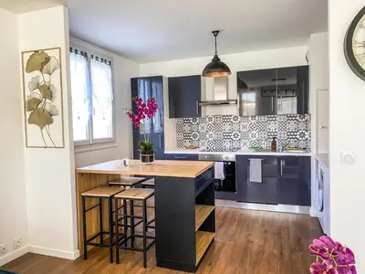 Cuisine ou kitchenette dans l'établissement T3 Moderne avec balcon terrasse et parking gratuit