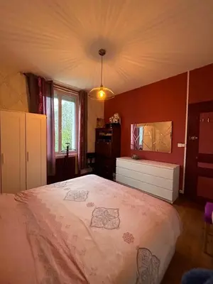 Un ou plusieurs lits dans un hébergement de l'établissement PARENTHÈSE Chambre Cosy proche Centre et Gare