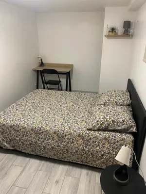 Un ou plusieurs lits dans un hébergement de l'établissement Appartement F2 proche Futuroscope