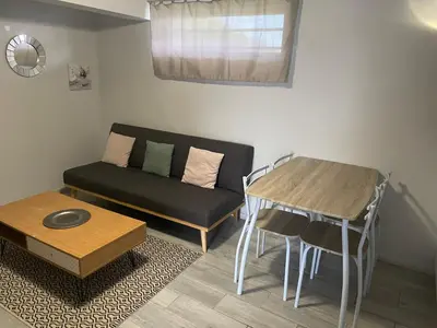 Coin salon dans l'établissement Appartement F2 proche Futuroscope