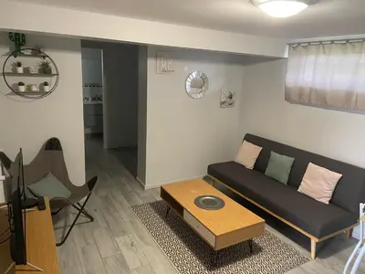 Coin salon dans l'établissement Appartement F2 proche Futuroscope