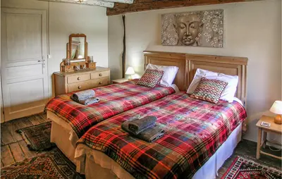 Un ou plusieurs lits dans un hébergement de l'établissement Amazing Home In Suaux