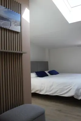 Un ou plusieurs lits dans un hébergement de l'établissement Maison Meire Studios