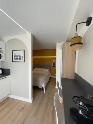 Un ou plusieurs lits dans un hébergement de l'établissement Maison Meire Studios