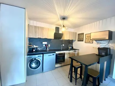 Cuisine ou kitchenette dans l'établissement La Coquille: bright, cozy, 3 min from Parc Expo