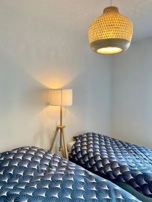 Un ou plusieurs lits dans un hébergement de l'établissement La Coquille: bright, cozy, 3 min from Parc Expo