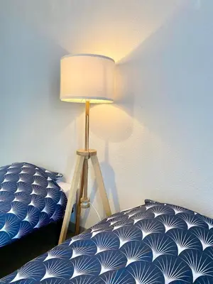 Un ou plusieurs lits dans un hébergement de l'établissement La Coquille: bright, cozy, 3 min from Parc Expo