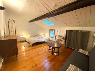 Un ou plusieurs lits dans un hébergement de l'établissement Le Clain de Vivonne, cosy appartement plein centre