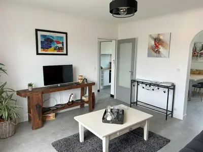 Télévision ou salle de divertissement dans l'établissement Le gîte de Marie