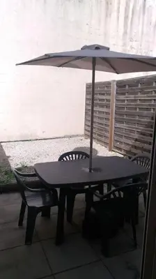 Balcon ou terrasse dans l'établissement Petite maison avec jardin