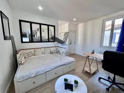 Un ou plusieurs lits dans un hébergement de l'établissement Le Moderne - Appartement situé en plein centre-ville