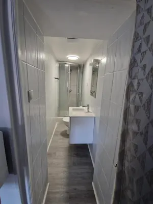 Salle de bains dans l'établissement Sarl la famille 3