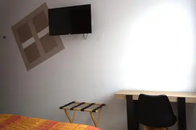 Télévision ou salle de divertissement dans l'établissement Relais 375