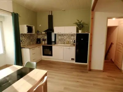 Cuisine ou kitchenette dans l'établissement MAISON DU SOUVENIR 70 m2 près du Futuroscope