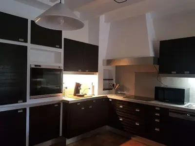 Cuisine ou kitchenette dans l'établissement Gîte du Louvanto