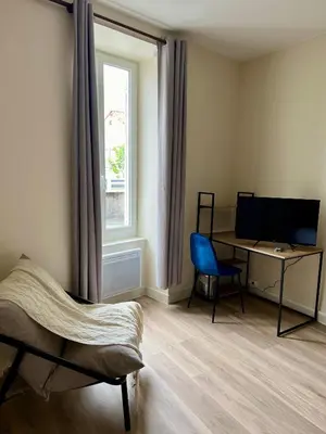 Télévision ou salle de divertissement dans l'établissement Chez Olivia