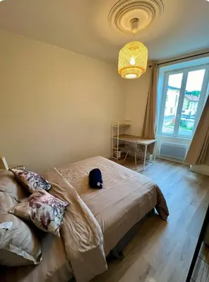 Un ou plusieurs lits dans un hébergement de l'établissement Chez Olivia