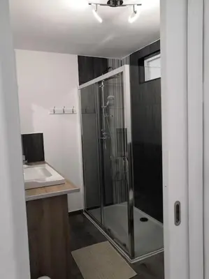 Salle de bains dans l'établissement Les Arcades, T2 en hypercentre
