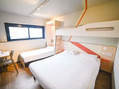 Un ou plusieurs lits dans un hébergement de l'établissement ibis budget Poitiers Site du Futuroscope