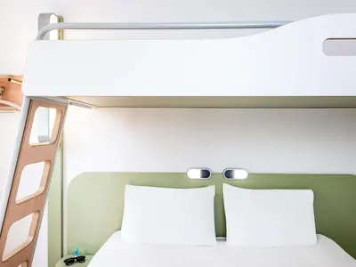 Un ou plusieurs lits dans un hébergement de l'établissement ibis budget Poitiers Site du Futuroscope