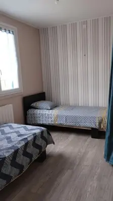 Un ou plusieurs lits dans un hébergement de l'établissement la petite cabane