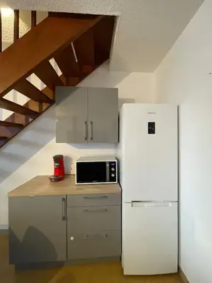 Cuisine ou kitchenette dans l'établissement Logement familial 3 chambres 2 wc 2 sdb Futuroscope Arena Aquascope Palais des Congrès