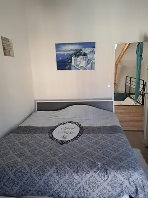 Un ou plusieurs lits dans un hébergement de l'établissement La maison de Caroline