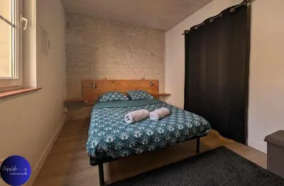 Un ou plusieurs lits dans un hébergement de l'établissement Le Paul by CozyLife - Centre Ville - Gare