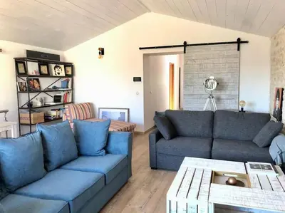 Coin salon dans l'établissement Maison à 10’ à pieds du port de La Rochelle