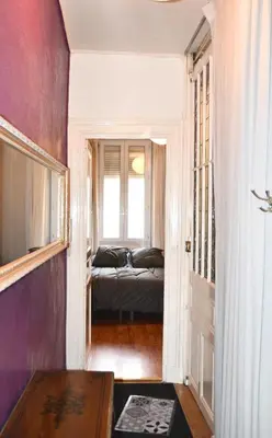 Un ou plusieurs lits dans un hébergement de l'établissement La Colbertine - Charming Apartment in Place Colbert