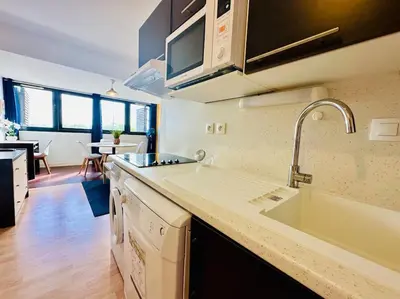 Cuisine ou kitchenette dans l'établissement Taouata - Face au port
