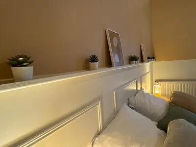 Un ou plusieurs lits dans un hébergement de l'établissement La Maison D'Oscar