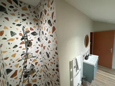 Cuisine ou kitchenette dans l'établissement La Maison D'Oscar