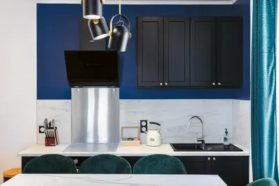 Cuisine ou kitchenette dans l'établissement Le baroque Rochelais