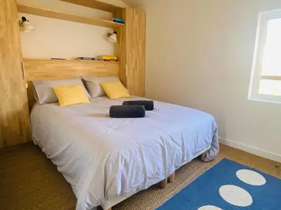 Un ou plusieurs lits dans un hébergement de l'établissement Bel appartement, Oiseau 1