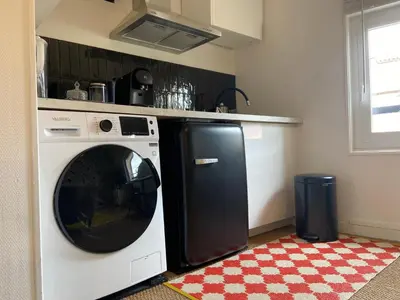 Cuisine ou kitchenette dans l'établissement Bel appartement, Oiseau 1