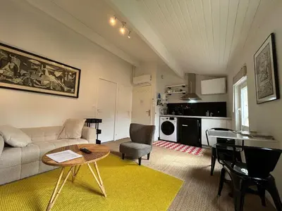 Coin salon dans l'établissement Bel appartement, Oiseau 1