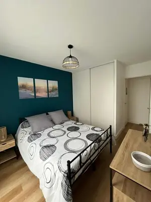 Un ou plusieurs lits dans un hébergement de l'établissement Appartement cosy au calme avec jardin et parking