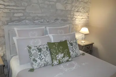 Un ou plusieurs lits dans un hébergement de l'établissement La Douce Charentaise