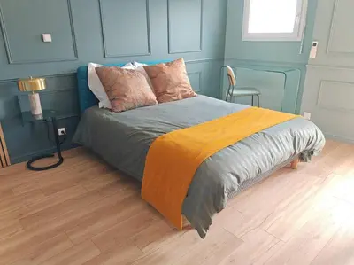 Un ou plusieurs lits dans un hébergement de l'établissement Appartement cosy climatisé