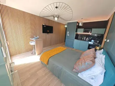 Télévision ou salle de divertissement dans l'établissement Appartement cosy climatisé