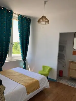 Un ou plusieurs lits dans un hébergement de l'établissement Les chambres du Phare - 3 chambres