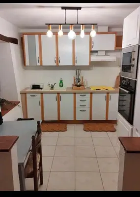 Cuisine ou kitchenette dans l'établissement Maison coeur de ferme