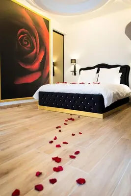 Un ou plusieurs lits dans un hébergement de l'établissement Love Room centre ville de Cognac