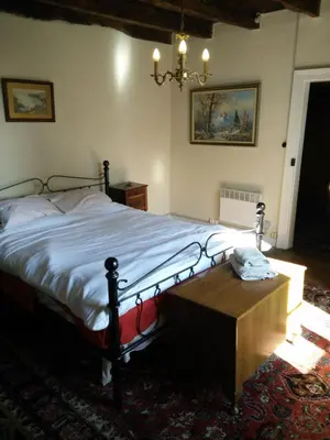 Un ou plusieurs lits dans un hébergement de l'établissement La Maison Bleue