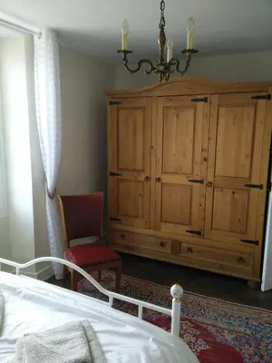 Un ou plusieurs lits dans un hébergement de l'établissement La Maison Bleue