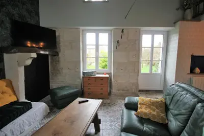 Coin salon dans l'établissement Gîte La Vigne Verte