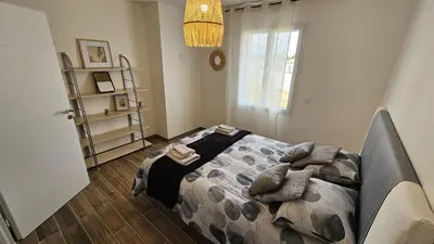 Un ou plusieurs lits dans un hébergement de l'établissement NeseHome, Maison à proximité du Futuroscope
