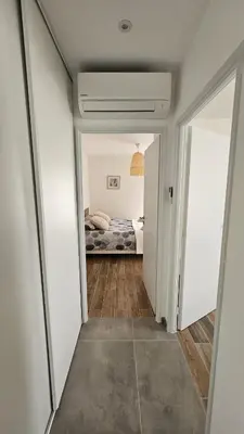 Un ou plusieurs lits dans un hébergement de l'établissement NeseHome, Maison à proximité du Futuroscope